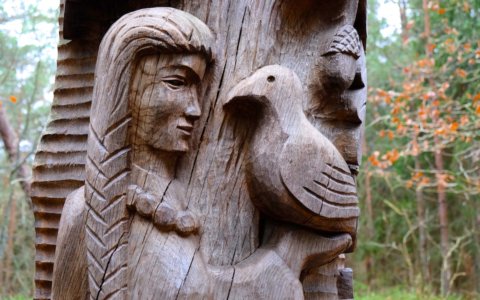 Tree carving of Neringa at the Hill of Witches, Curonian Spit, Lithuania